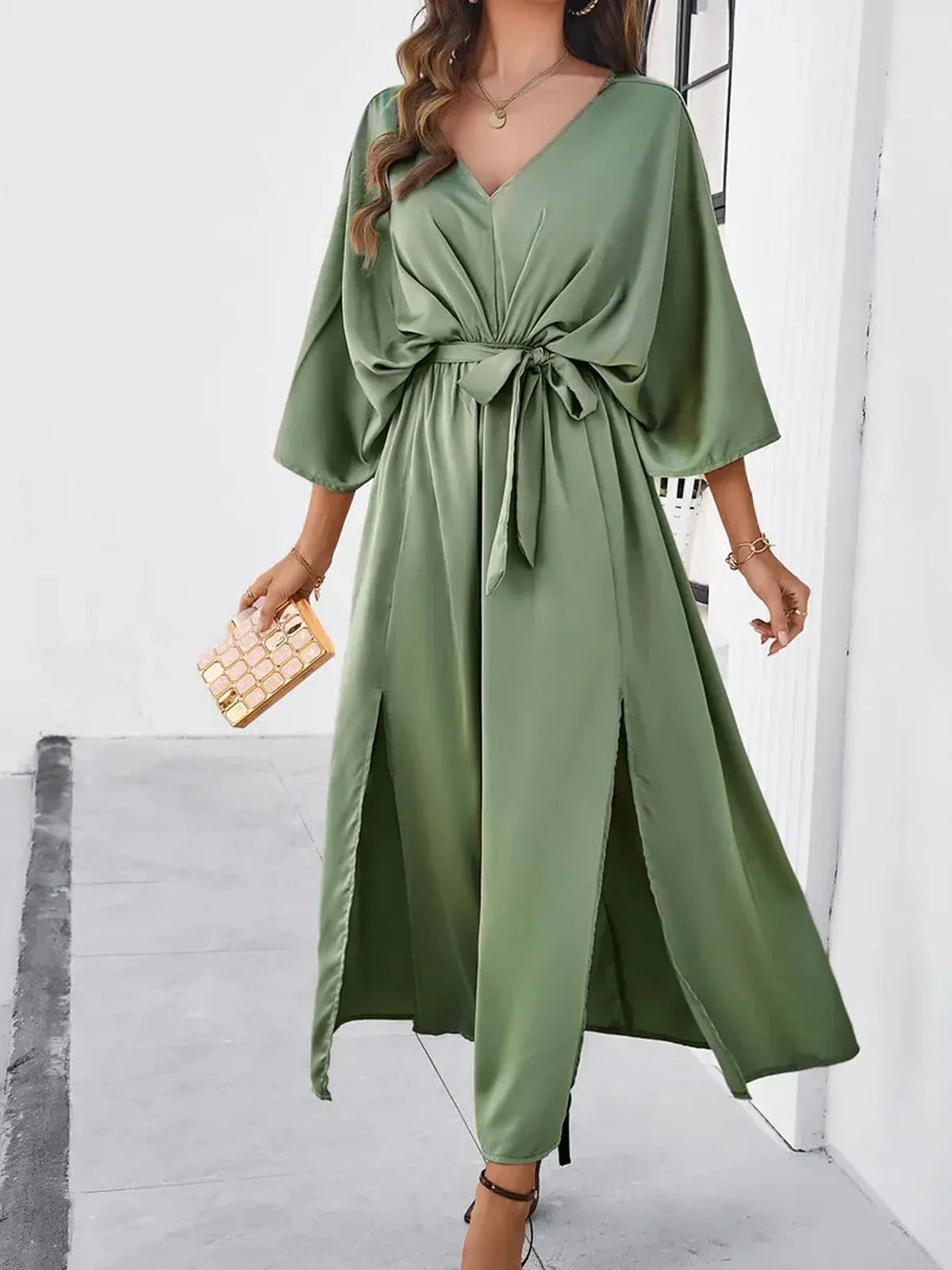 Flowing Serenity Maxi Dress in olive green with kimono sleeves and adjustable waist tie, perfect for elegant occasions.