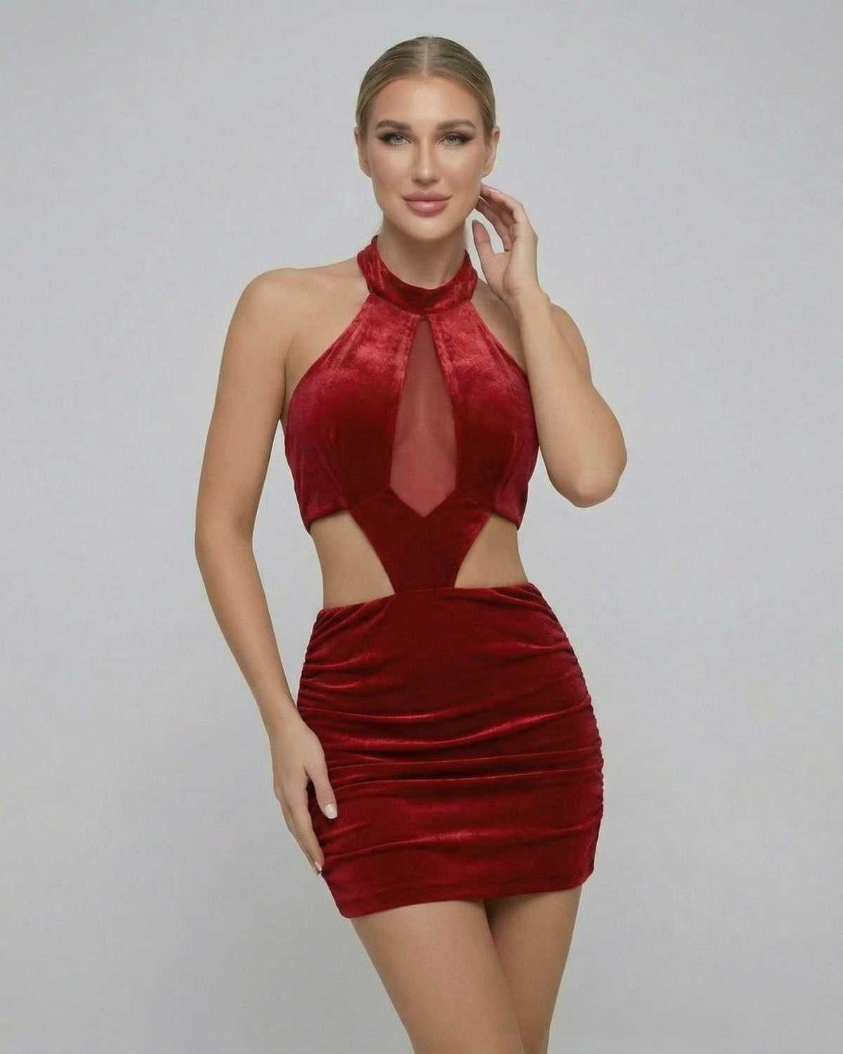 Valencia Mini Dress by Lauven - Red velvet bodycon mini dress with sleeveless halter neck and stylish cutouts.