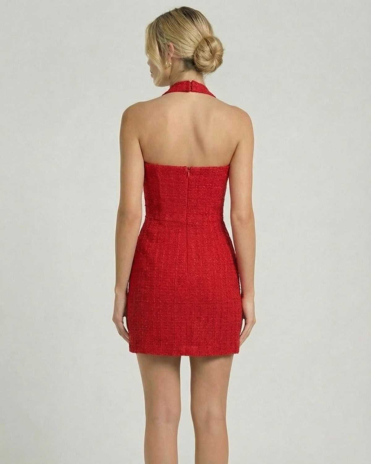 Back view of the Scarlett Mini Dress by Lauven, showcasing the structured A-line design and halter neckline.
