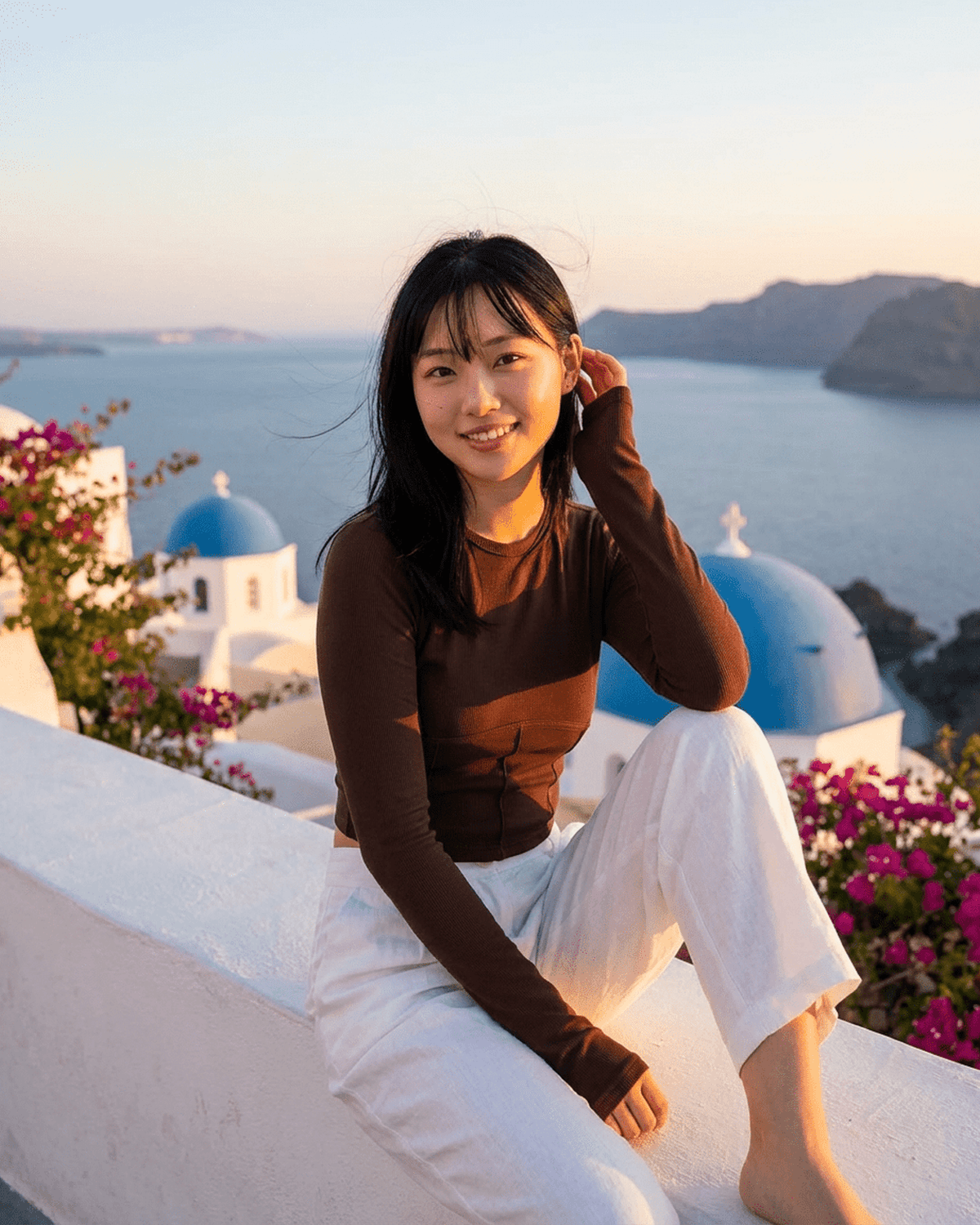 Cocoa Corset Top model in Santorini, showcasing Lauven's stylish long sleeve jersey corset crop.