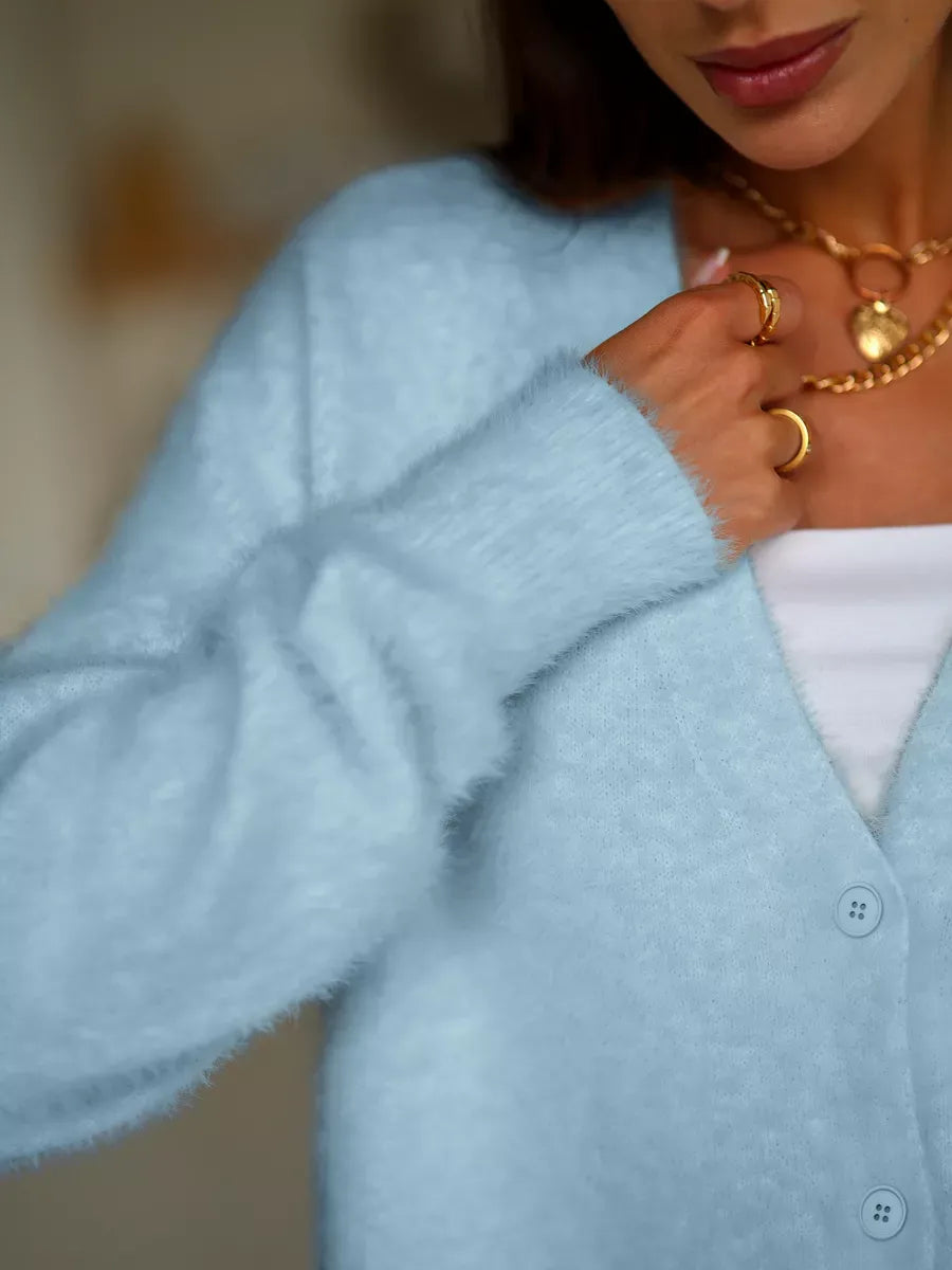 Skyler Cardigan by Lauven, soft blue oversized knitwear with button closure, perfect for layering in cooler seasons.