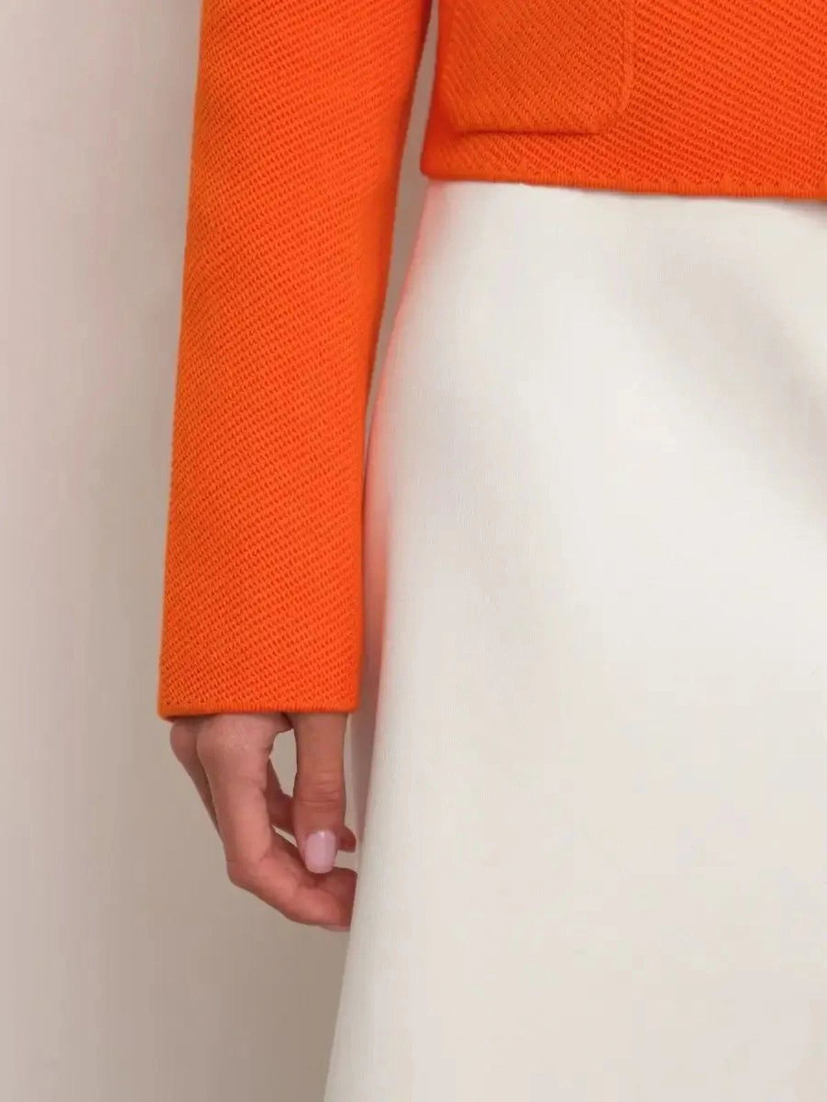 Coral Jacket by Lauven, cropped orange women's jacket with button closure and modern relaxed fit.