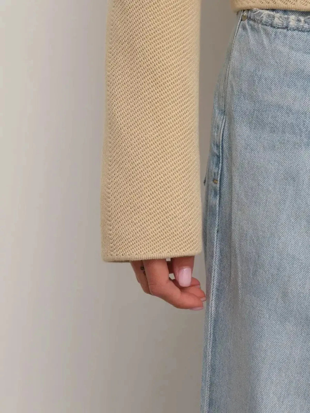 Alba Jacket sleeve detail showcasing light beige fabric and stylish design by Lauven.