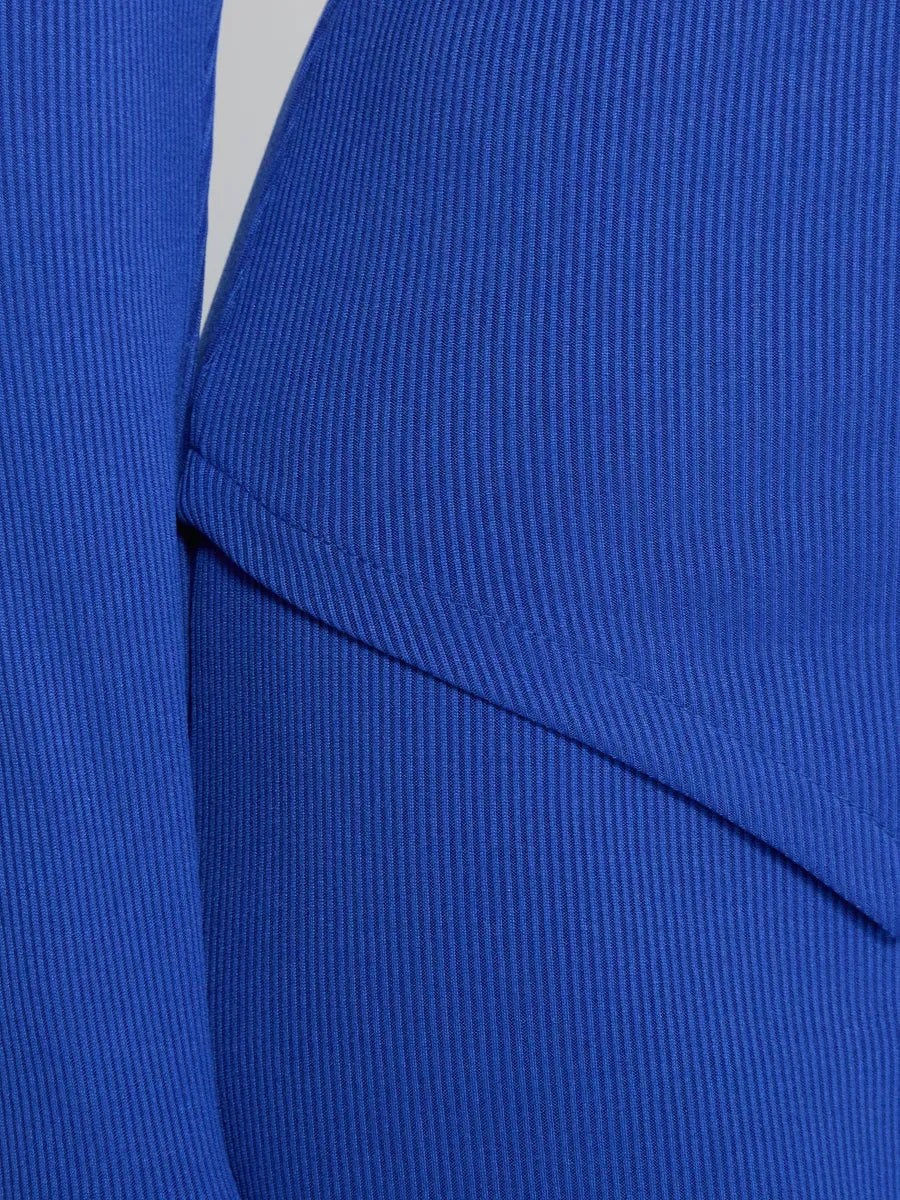 Close-up of soft ribbed fabric in the Azure Two-Piece Set by Lauven, showcasing elegant texture and vibrant blue color.