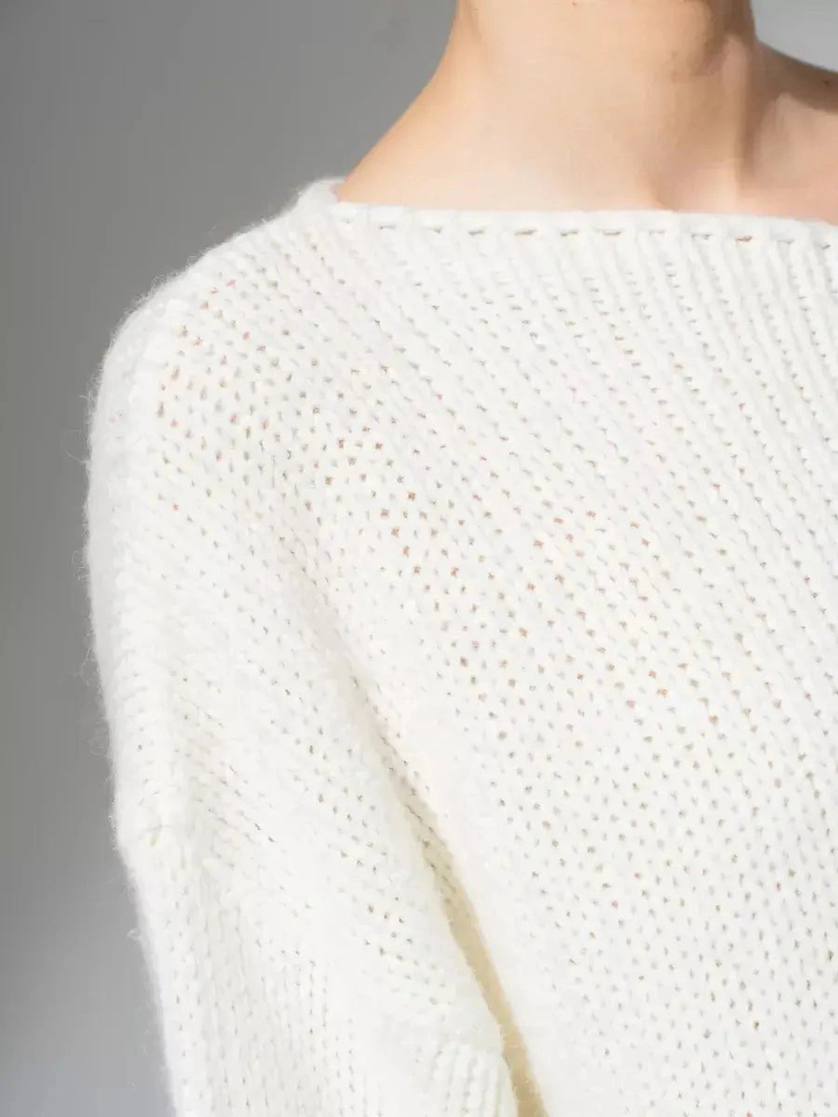 Ivory Sweater by Lauven - Oversized Off-Shoulder Knit in White showcasing luxurious textures.