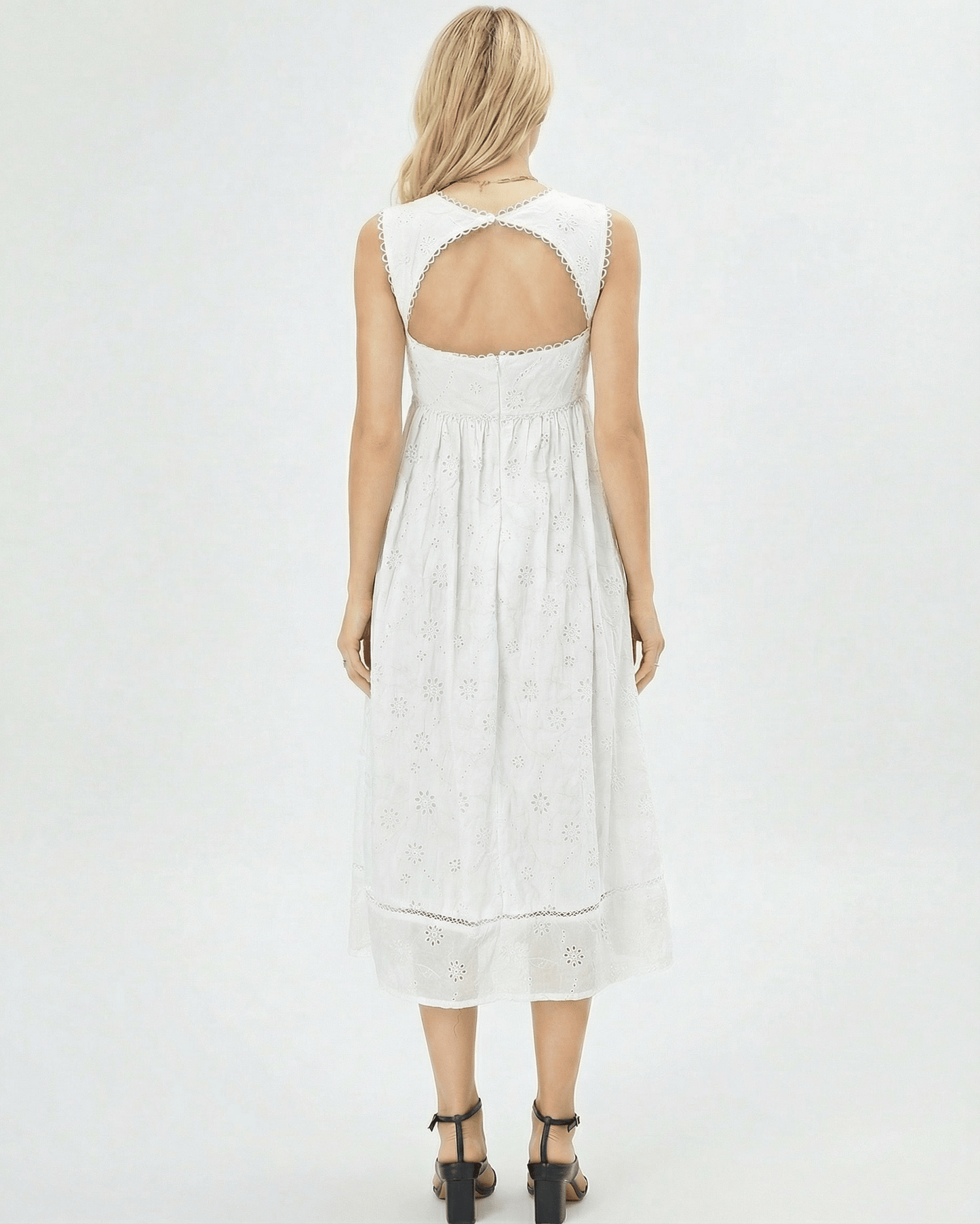 Aurelia Midi Dress by Lauven, showcasing an elegant white lace square neck and open back design.