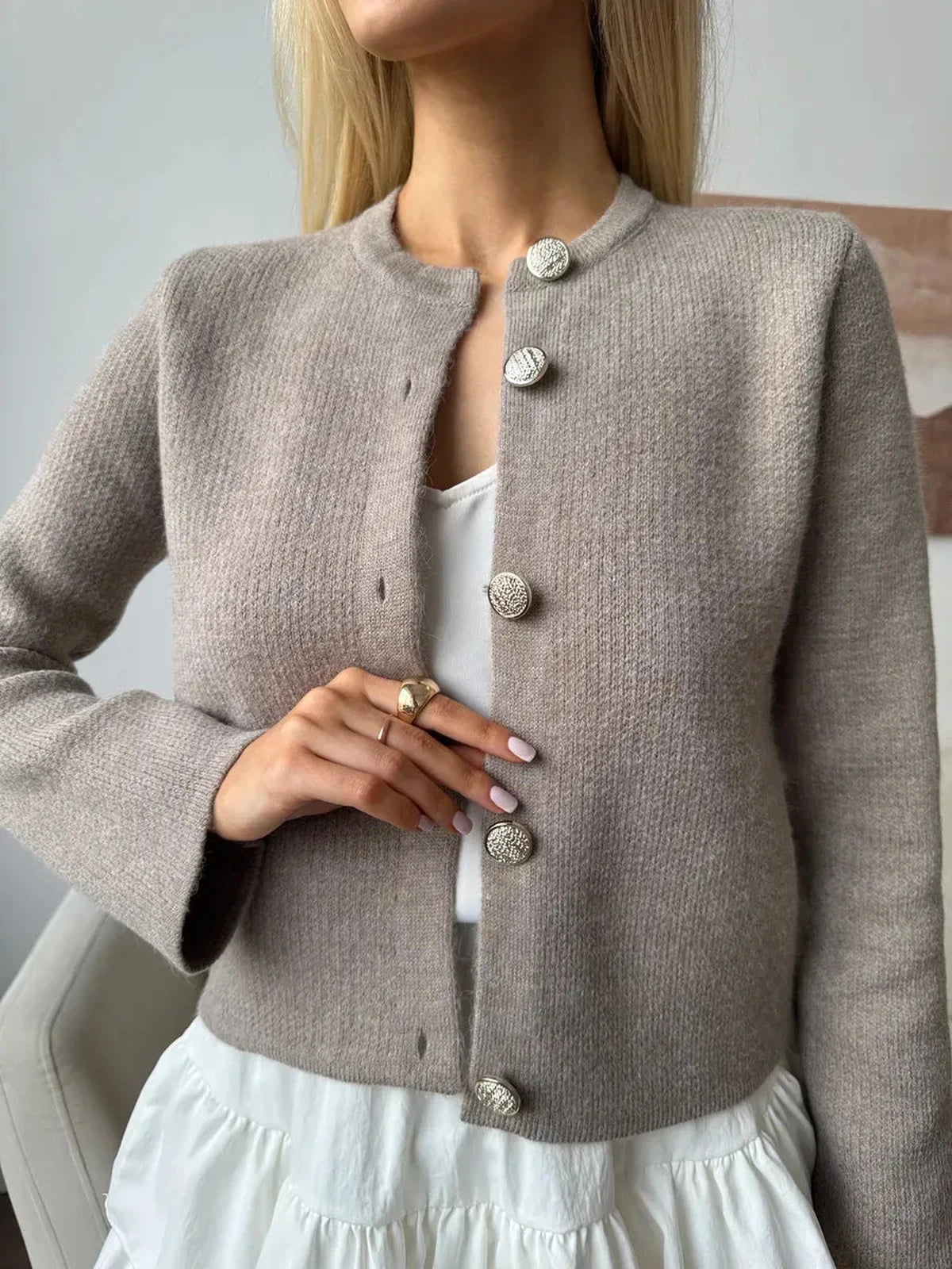 Aveline Cardigan by Lauven, soft cappuccino cropped knitwear with decorative buttons, perfect for layering.