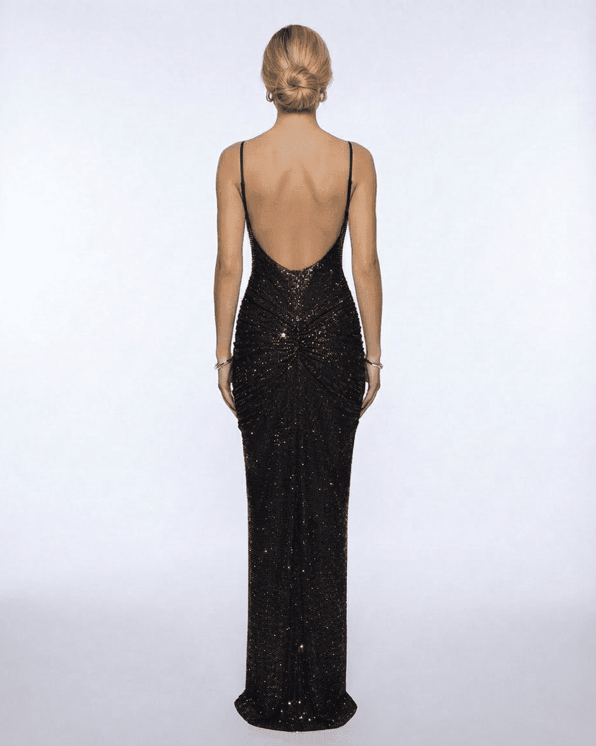 Back view of Nova Maxi Dress by Lauven, featuring an open-back design and crystal embellishments.