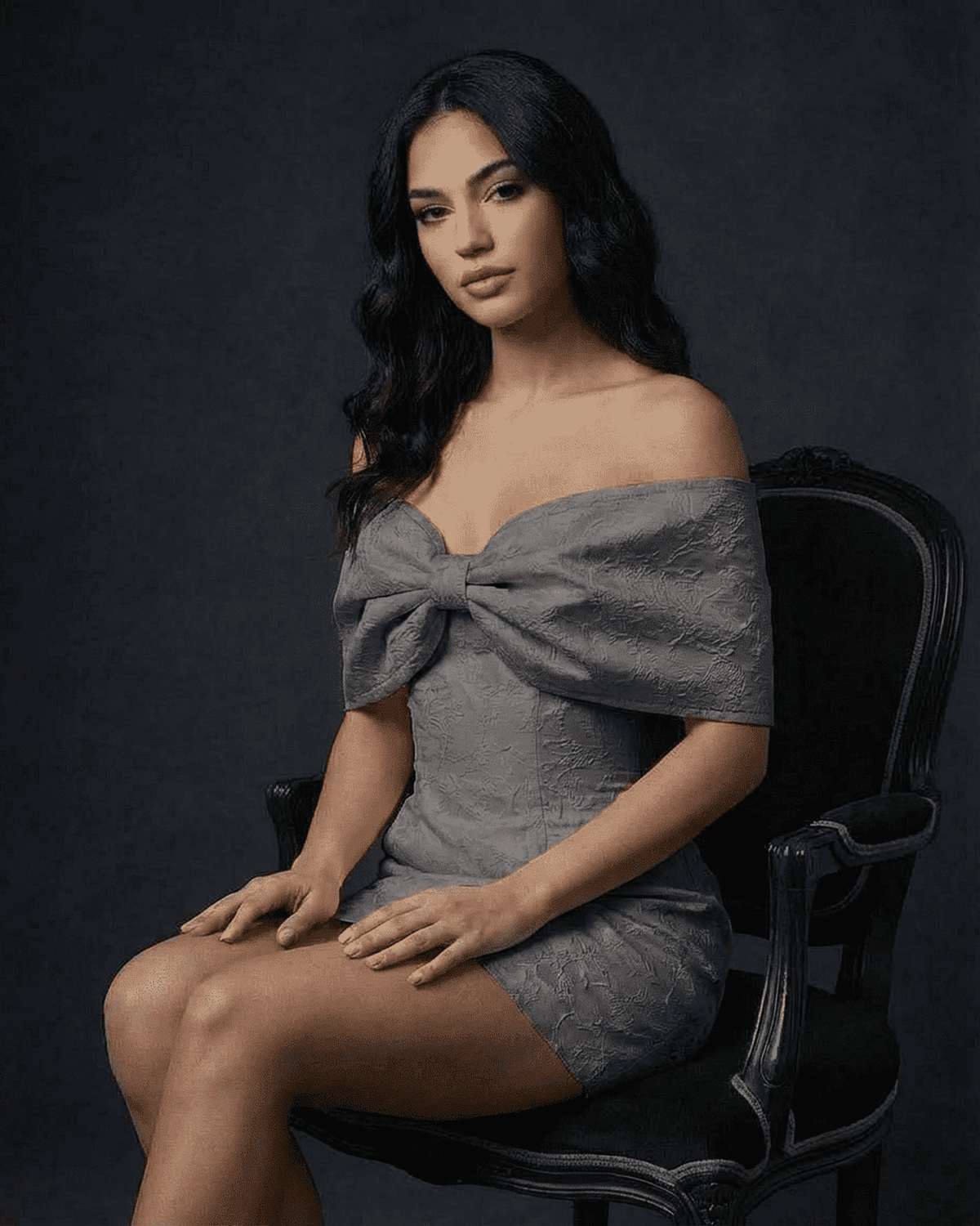 Lauven Charcoal Mini Dress featuring an elegant off-the-shoulder bowknot and a flattering A-line silhouette.