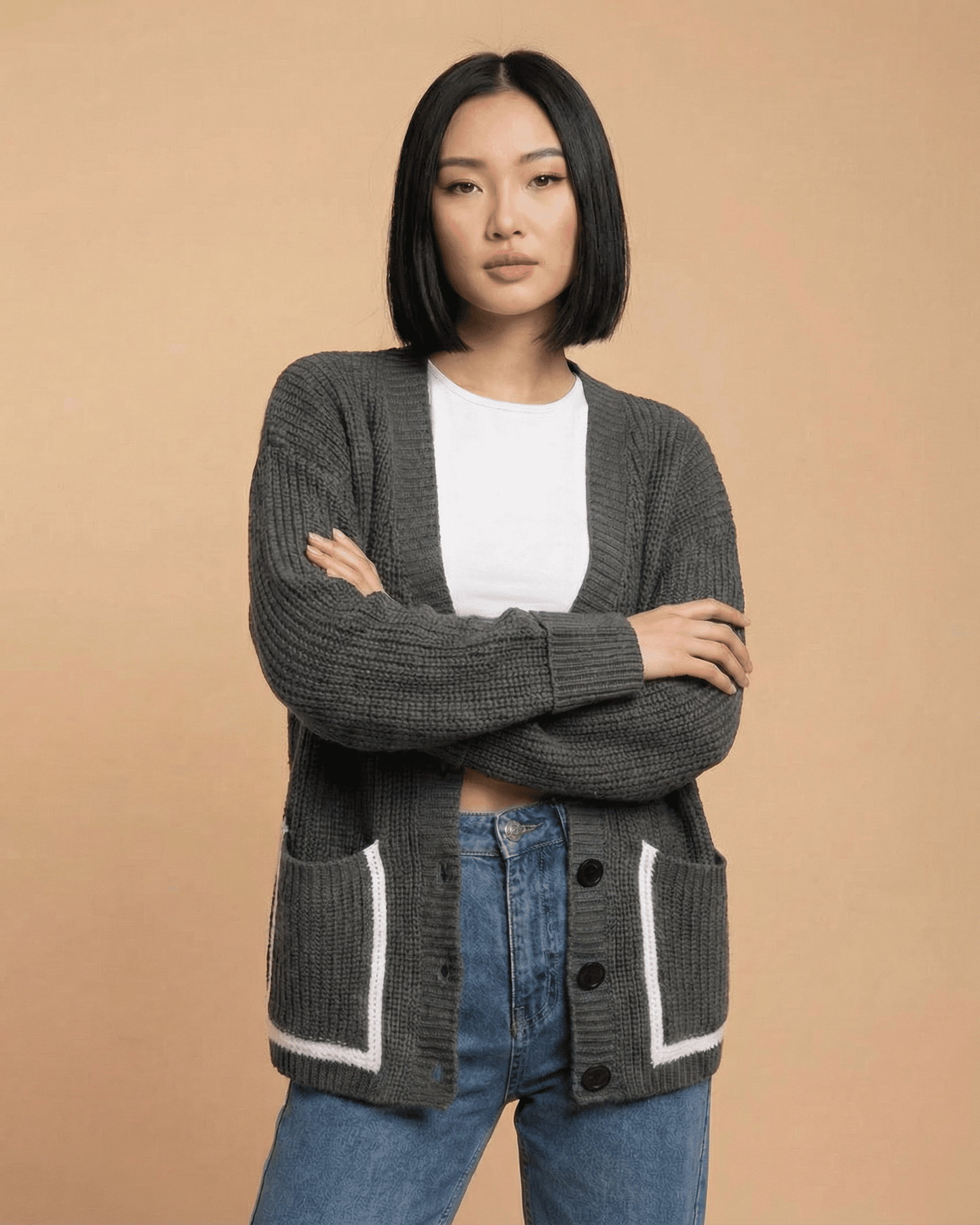 Linden Cardigan by Lauven featuring a relaxed V-neck, color block design, and pockets, perfect for layering.