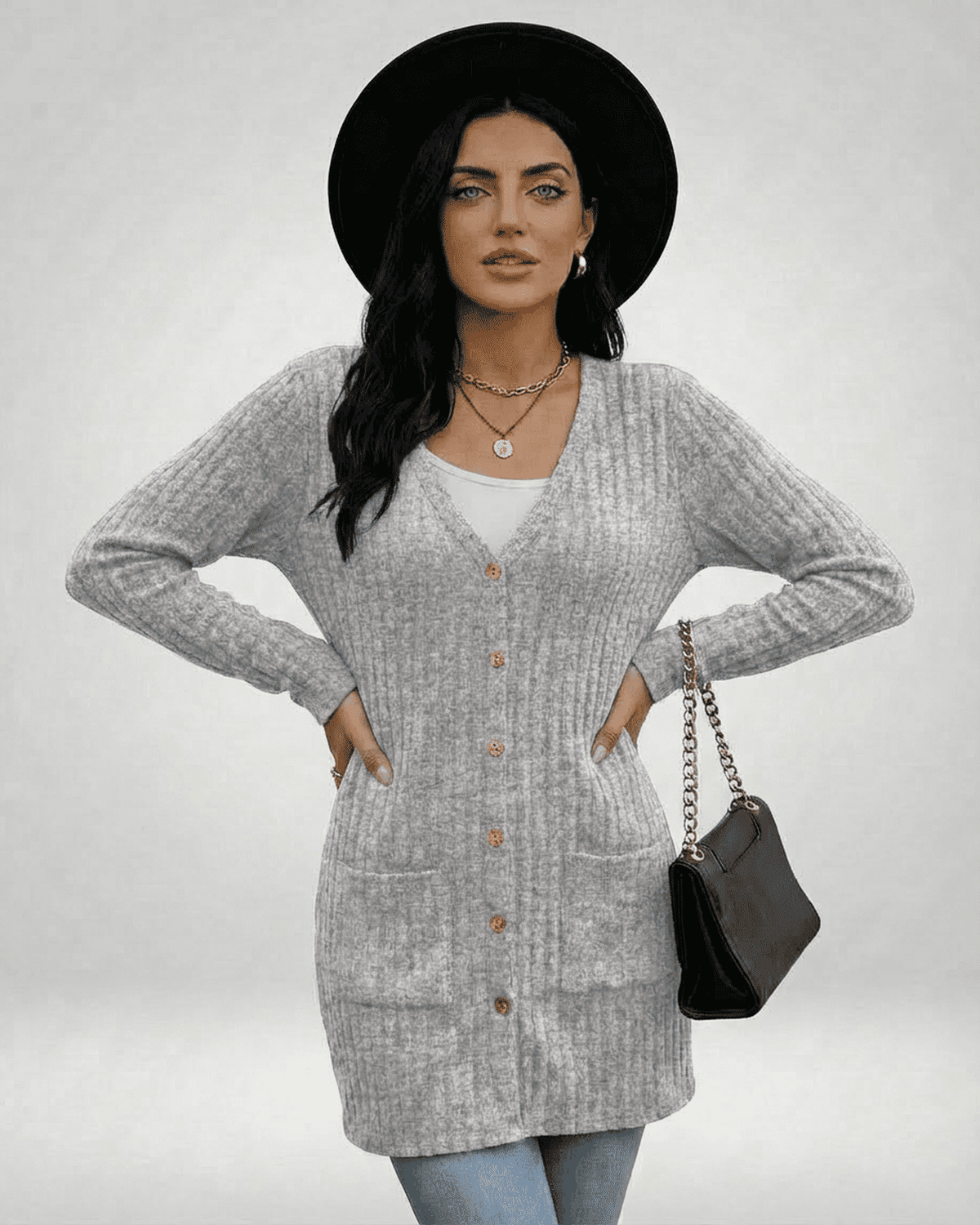 Luna Cardigan by Lauven, showcasing a stylish longline button-front design with ribbed knit texture.