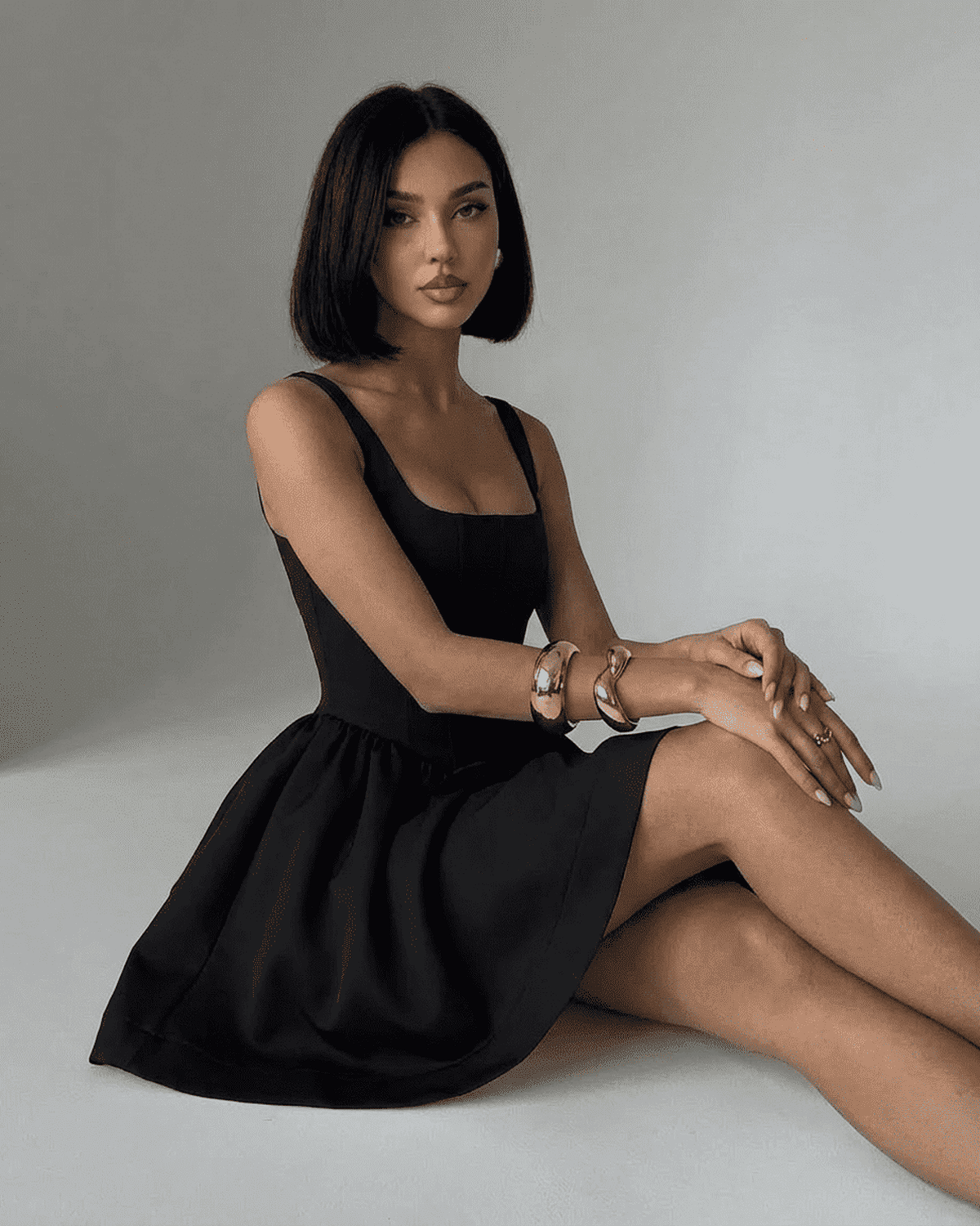 Lauven Nocturne Mini Dress in black, featuring a structured corset, square neckline and tailored silhouette.