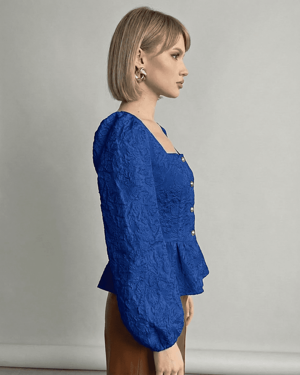 Sapphire Corset Top by Lauven, featuring a jacquard texture and structured square neckline in a deep blue tone.