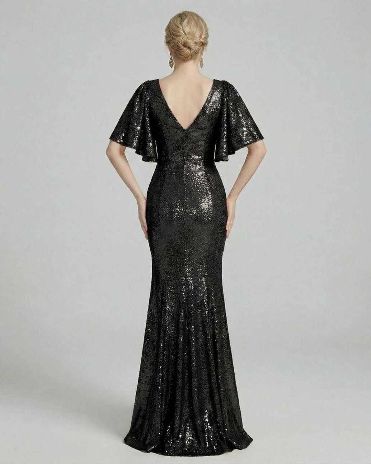 Selene Maxi Dress by Lauven, elegant black sequin evening gown with a flattering trumpet shape and cape sleeves.