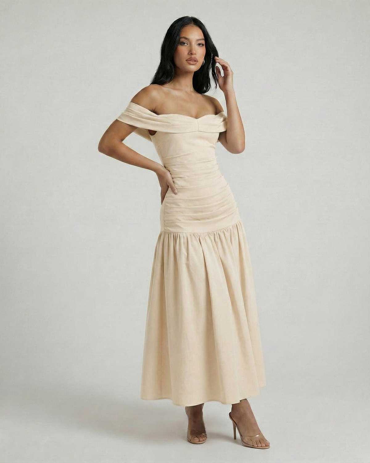 Seren Midi Dress by Lauven, featuring a soft beige off-shoulder design that accentuates the neckline and waistline.