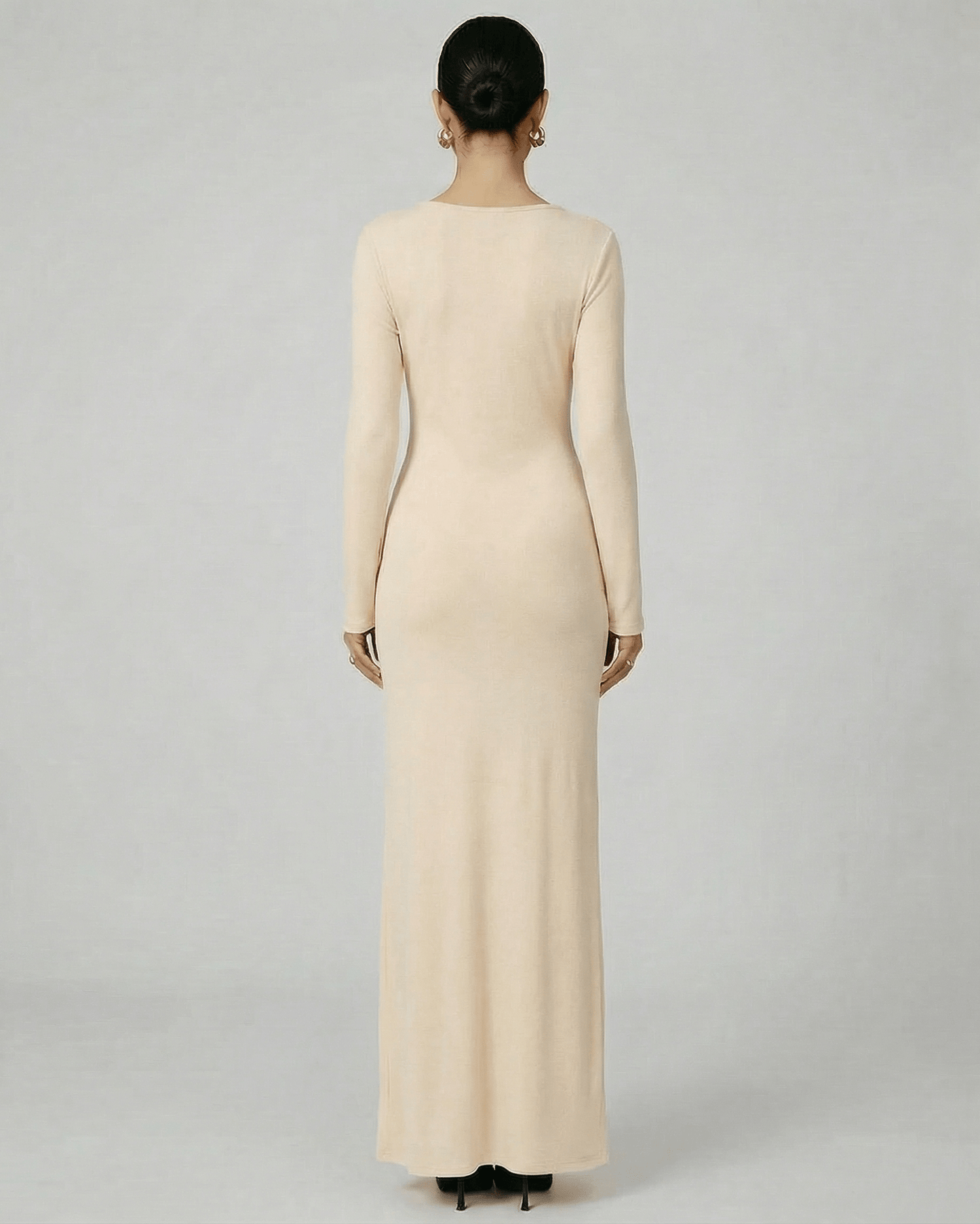 Solea Maxi Dress by Lauven - Beige long sleeve bodycon maxi dress showcasing a sleek back view and fluid silhouette.