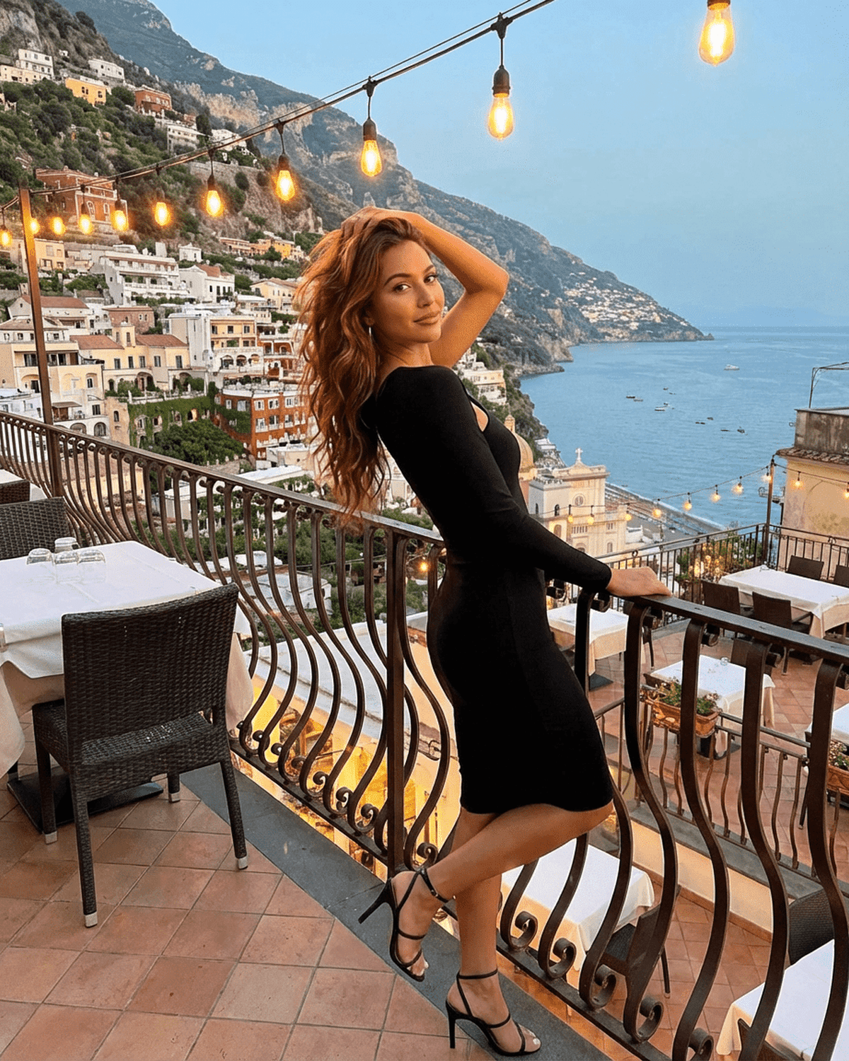 Vega Midi Dress by Lauven, stylish one-shoulder bodycon dress with scenic Amalfi Coast backdrop.