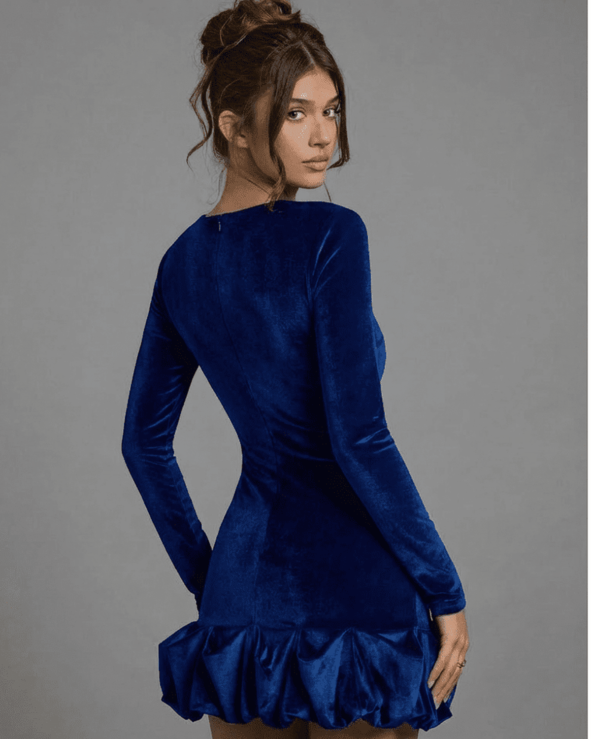 Velora Mini Blue by Lauven featuring a back view of a luxe velvet pleated hem bodycon dress in blue.