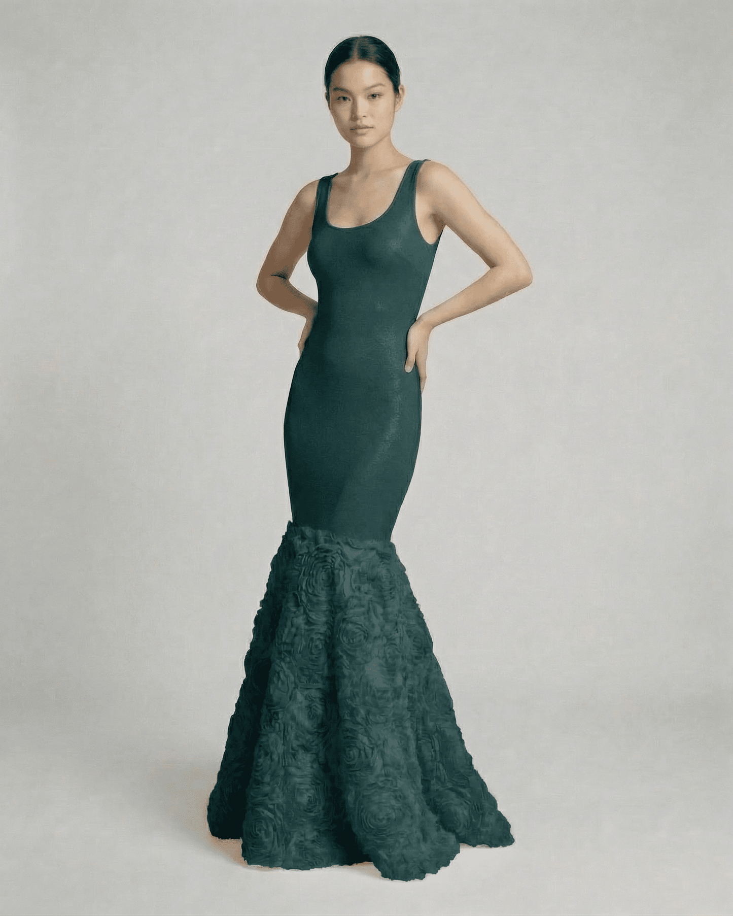 Verdeux Maxi Dress by Lauven, a sleeveless teal maxi dress with a textured rosette hem.