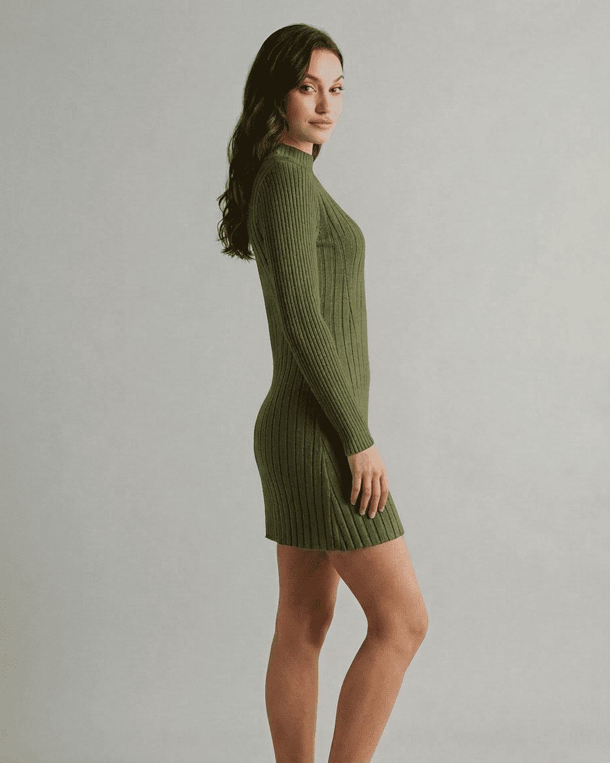 Verona Mini Dress by Lauven, showcasing a ribbed knit design in green, mock neck, and long sleeves.