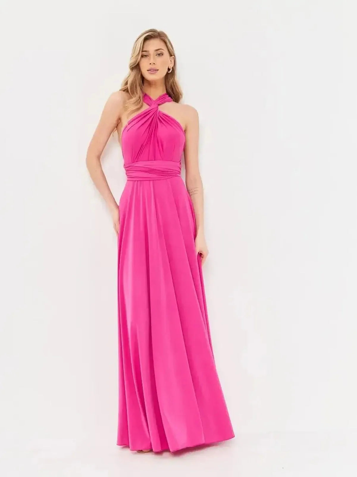 Maxi Dress Lush Twist in vibrant fuchsia pink, featuring halter neckline and elegant drape, perfect for summer events.