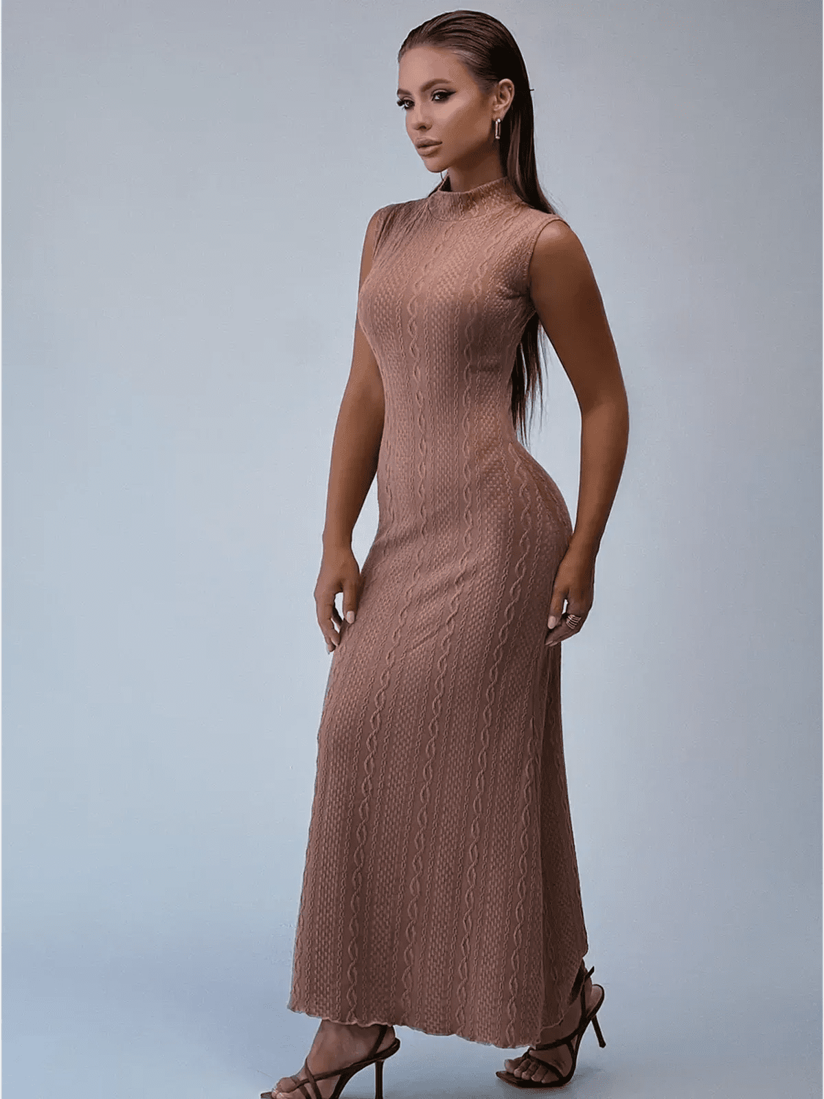 Museline Maxi Dress in cocoa-toned jacquard, featuring intricate cable patterns and a sleek bodycon silhouette.