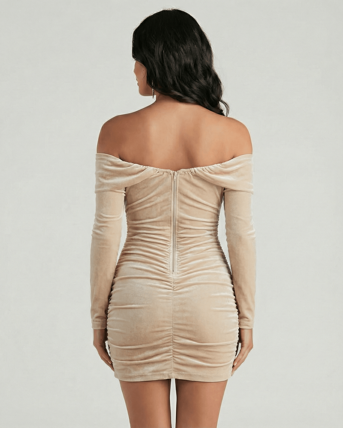 Back view of the Lauven Savona Mini Dress in beige velvet with off shoulder design and long sleeves.