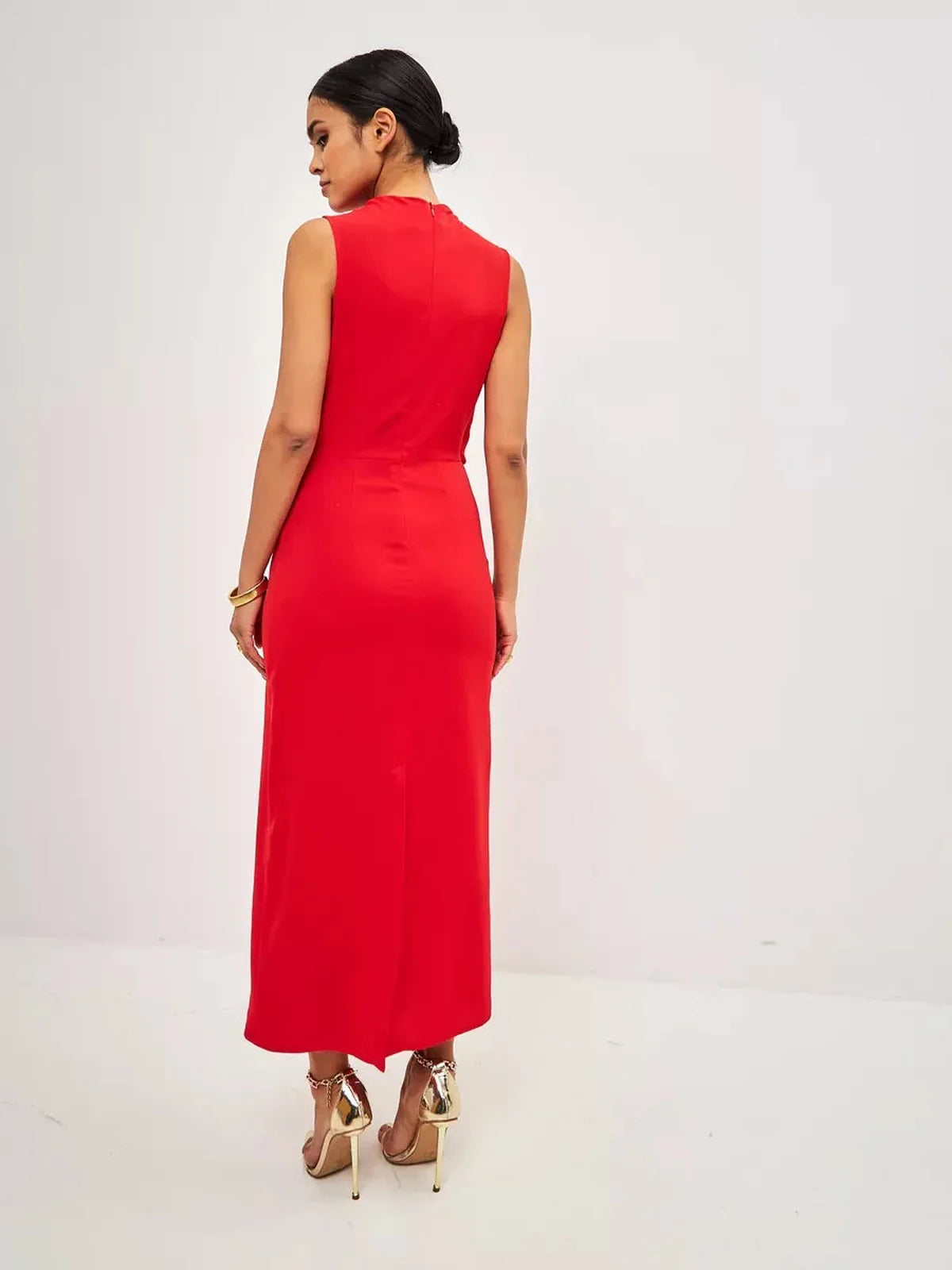 Back view of a sleek Red Drape Maxi Dress highlighting its elegant silhouette and fluid drape, ideal for formal occasions.