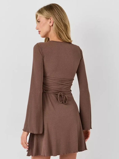 Mocha Flare long sleeve mini dress featuring bell sleeves and a flared hem, perfect for summer weddings and casual events.