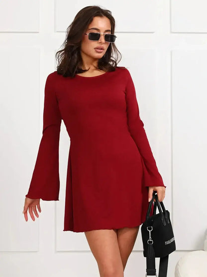 Ruby Laced red mini dress with long bell sleeves, perfect for parties and special occasions.