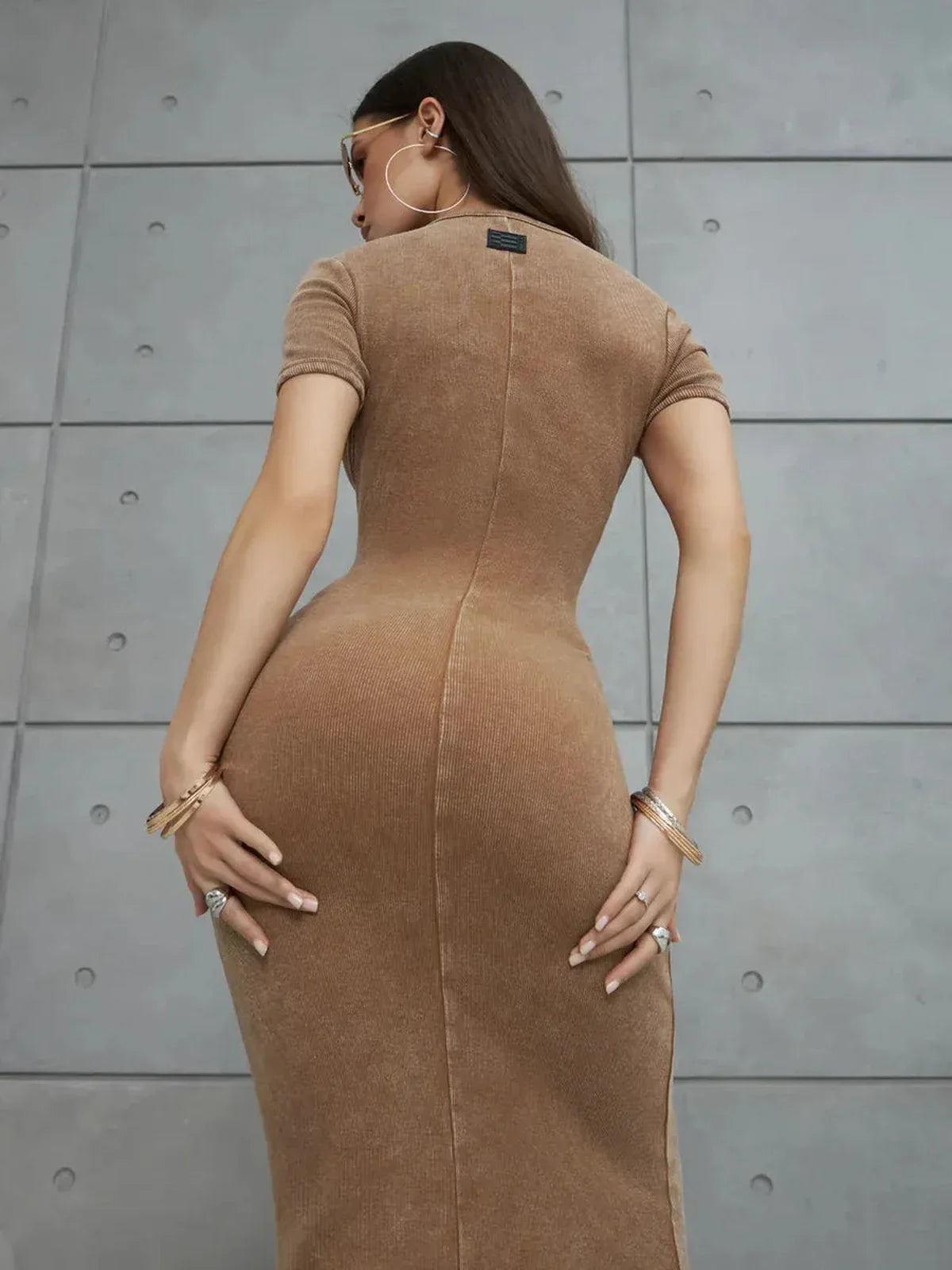 Back view of the Sculpted Ease Maxi Dress in washed tobacco hue showcasing its fitted silhouette.