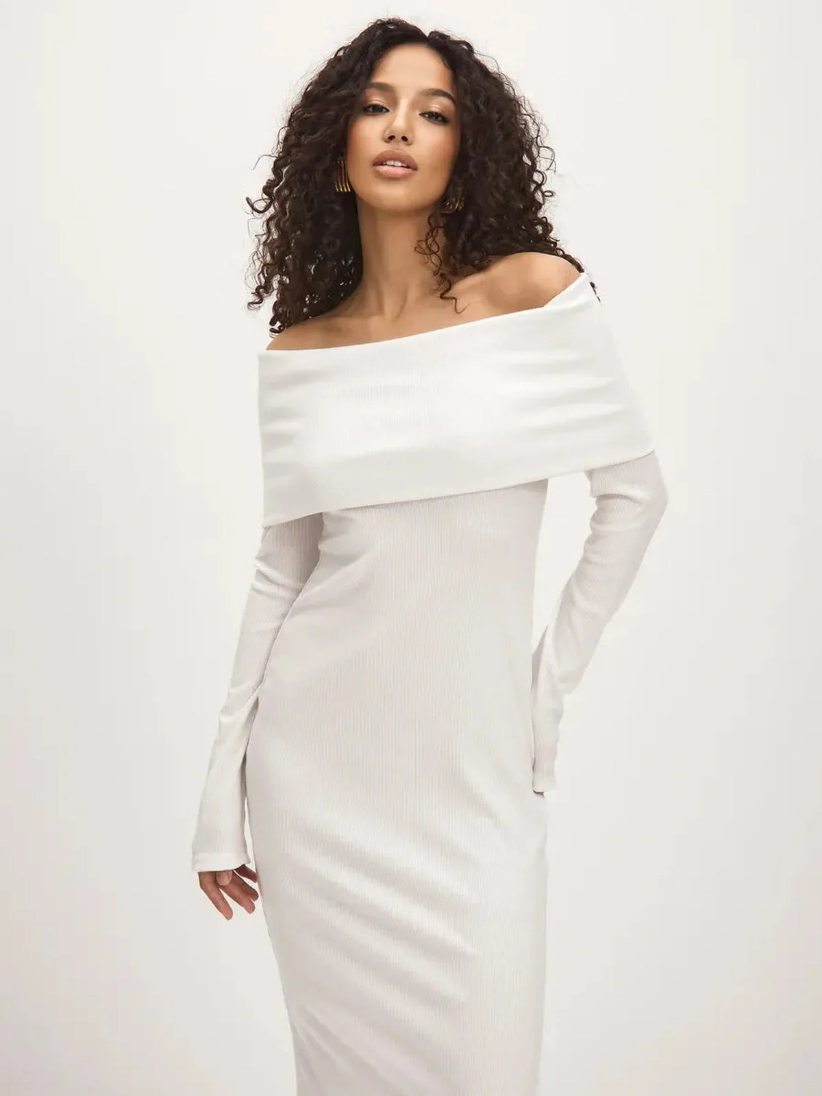 Sculpted Grace Maxi Dress in white, featuring an off-shoulder neckline and body-skimming silhouette with side slit.