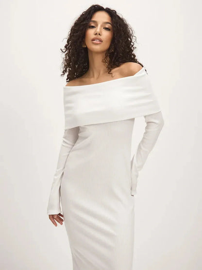 Sculpted Grace Maxi Dress in white, featuring an off-shoulder neckline and body-skimming silhouette with side slit.