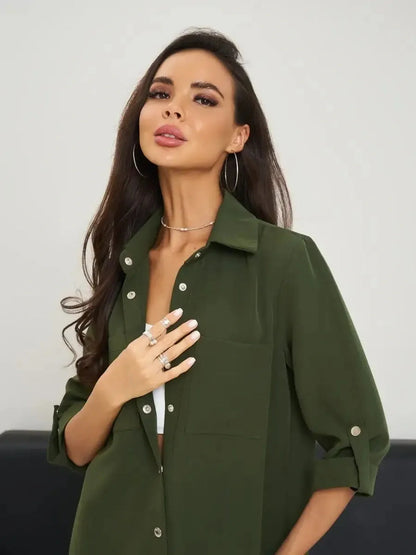 Urban Utility olive green belted shirt mini dress, featuring a polished snap-button front and stylish relaxed silhouette.