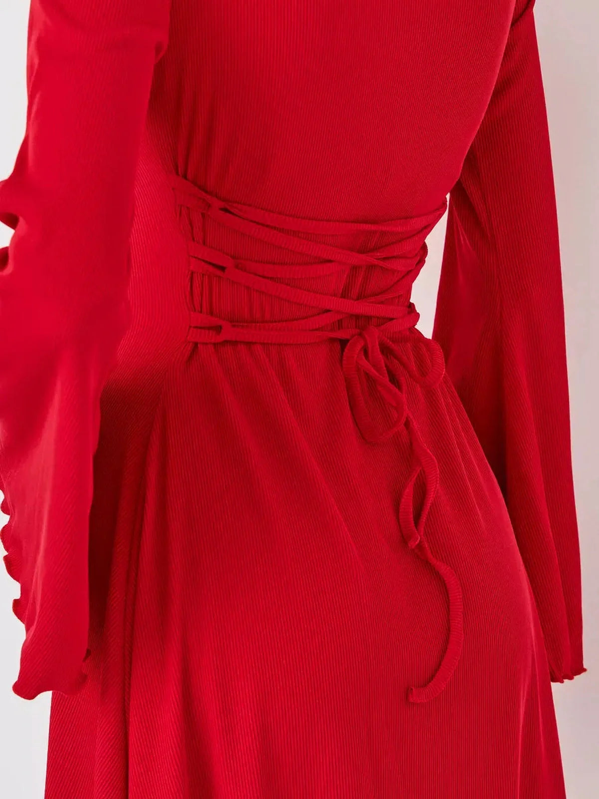Back view of Flare Cutout Mini red dress showcasing its waist-cinching lace-up detail and elegant silhouette.