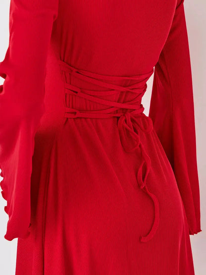 Back view of Flare Cutout Mini red dress showcasing its waist-cinching lace-up detail and elegant silhouette.