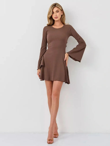 Flare Hour Mini dress in soft ribbed knit, featuring flared bell sleeves and a flattering A-line silhouette.