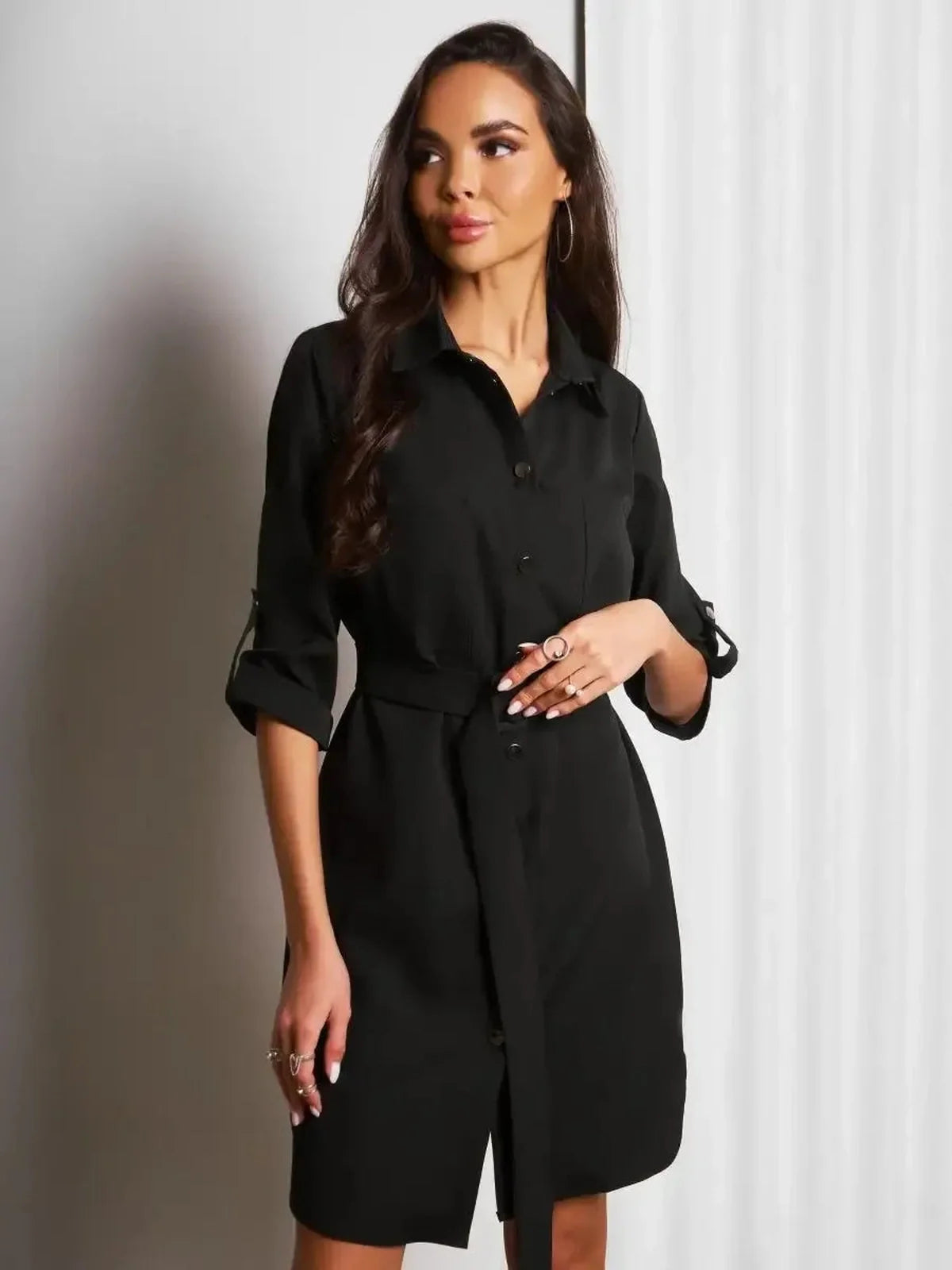 Urban Edit Mini black shirt-dress featuring a structured silhouette and detachable belt, perfect for day-to-night wear.