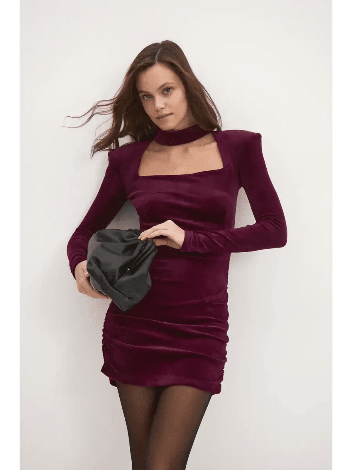 Long sleeve burgundy velvet mini dress with choker neckline, perfect for wedding guests and party occasions.