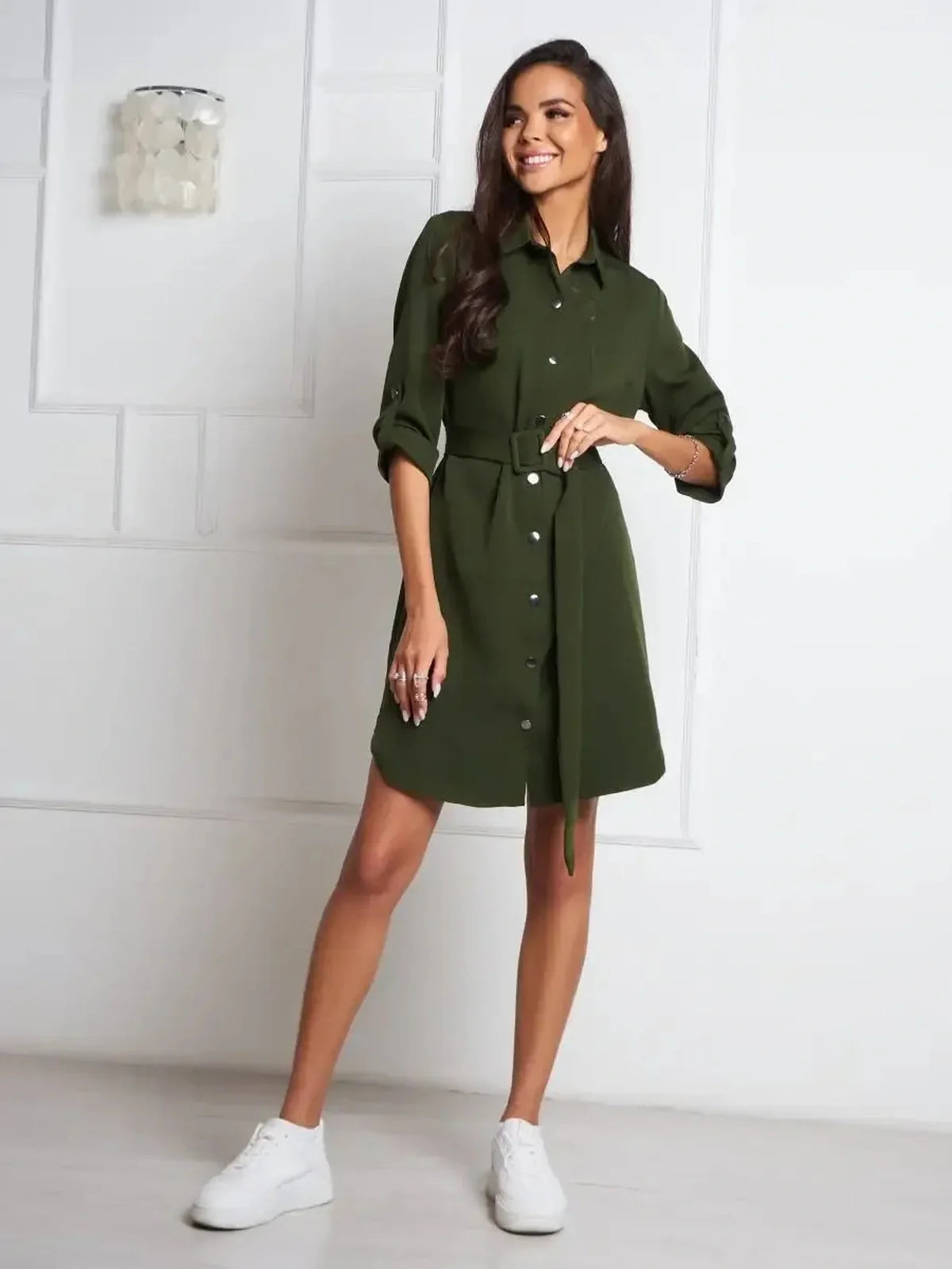 Urban Utility belted shirt mini dress in olive green, featuring snap-button front and relaxed silhouette.