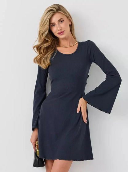 Graphite Grace mini dress in navy with bell sleeves, showcasing a flattering A-line silhouette and chic styling.