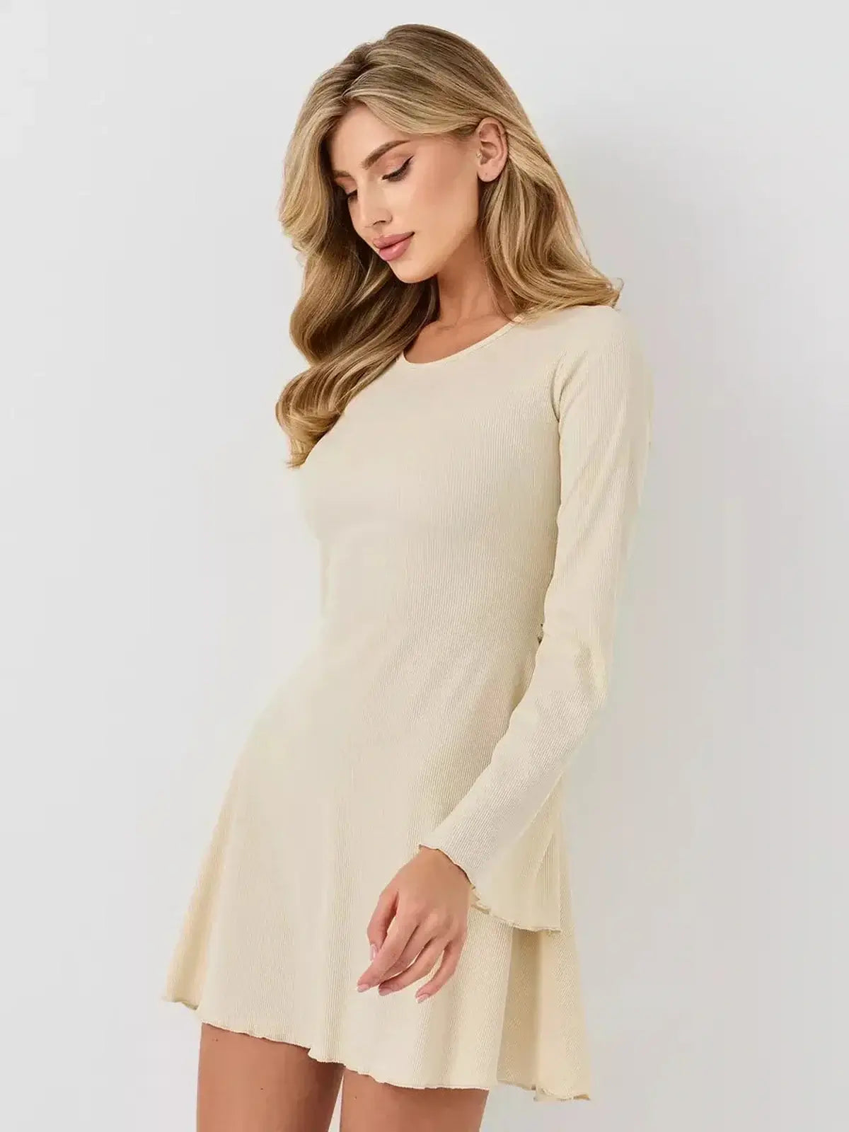 Ivory Flare long sleeve mini dress with flared skirt and ribbed texture, perfect for wedding guests and summer outings.