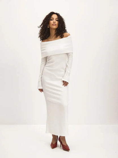 Sculpted Grace Maxi Dress in white, featuring off-shoulder neckline and side slit, exuding elegance and luxury.