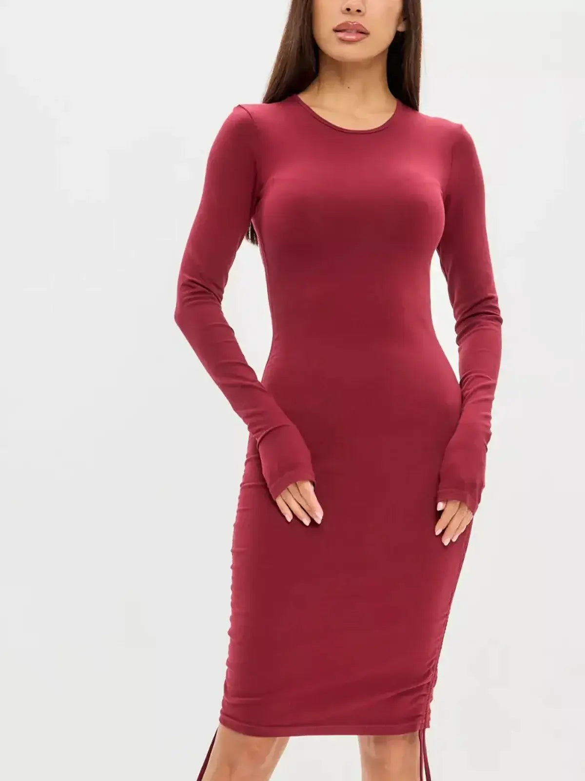 Long sleeve burgundy sculpt mini dress, ultra-smooth with side draping, perfect for cocktail or wedding guest occasions.