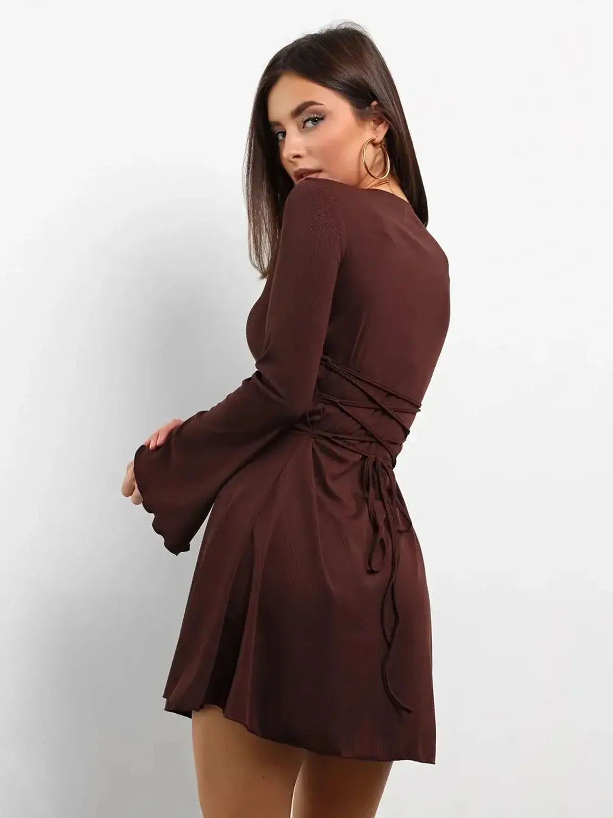 Cocoa Laced sultry mini dress in rich chocolate tone with flared sleeves and adjustable lace-up detail, perfect for summer events.