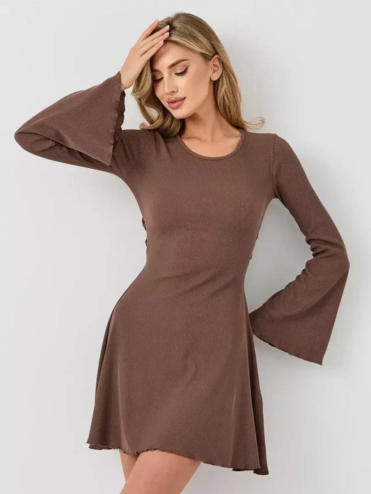 Model wearing the Mocha Flare mini dress with long bell sleeves in a rich coffee tone, perfect for summer and formal occasions.