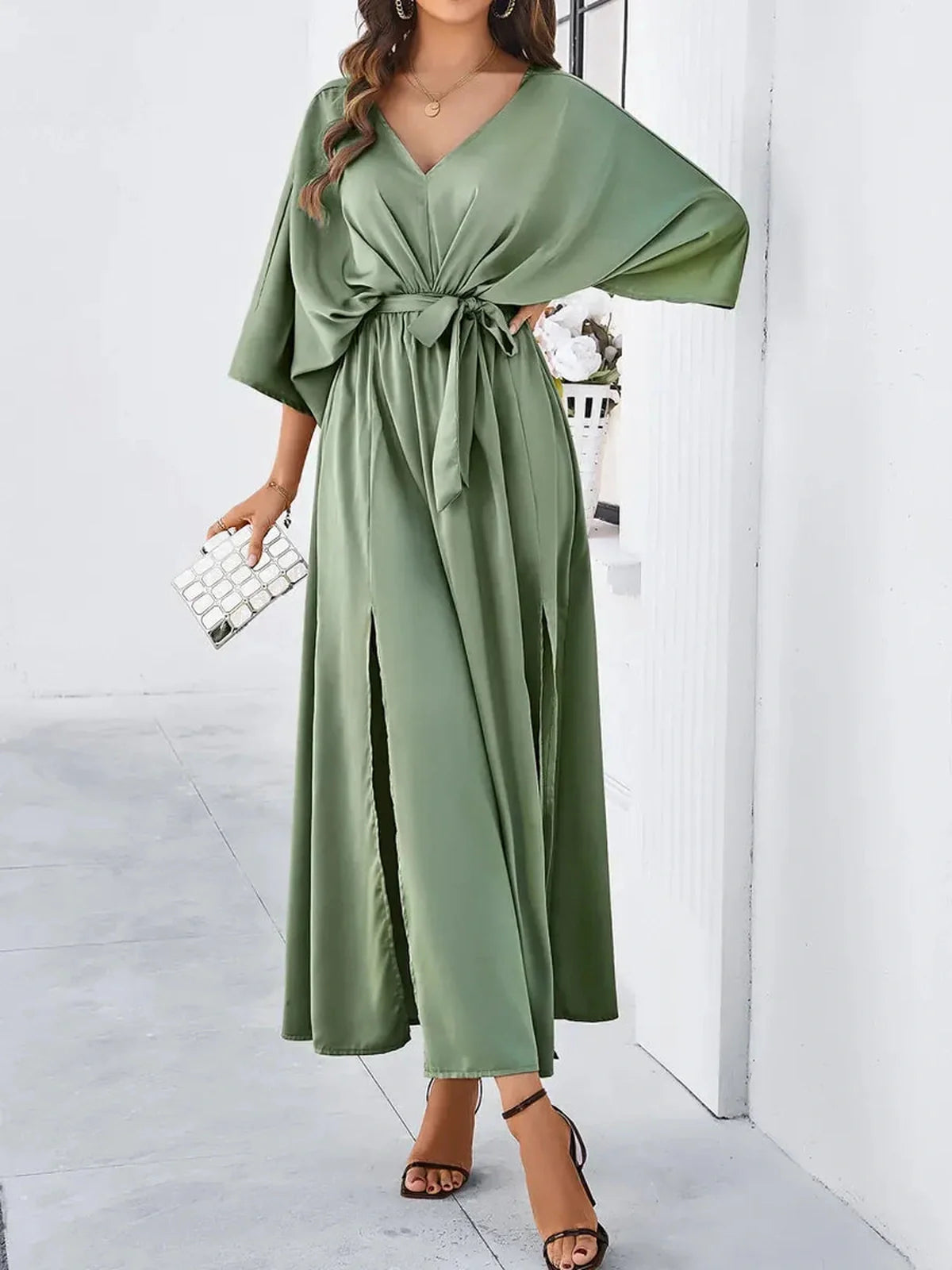 Elegant Serenity Maxi Dress in green with kimono sleeves, V-neckline, and adjustable waist tie for graceful movement.