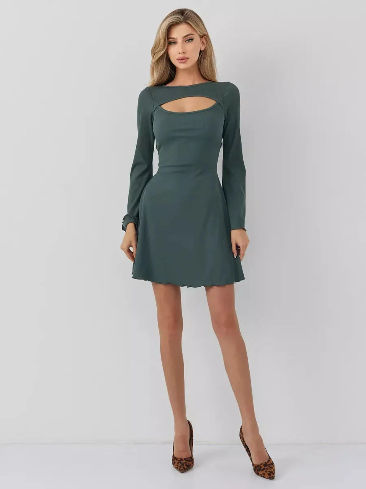 Dark olive mini dress with a cut-out neckline and bell sleeves, showcasing a flattering A-line silhouette.