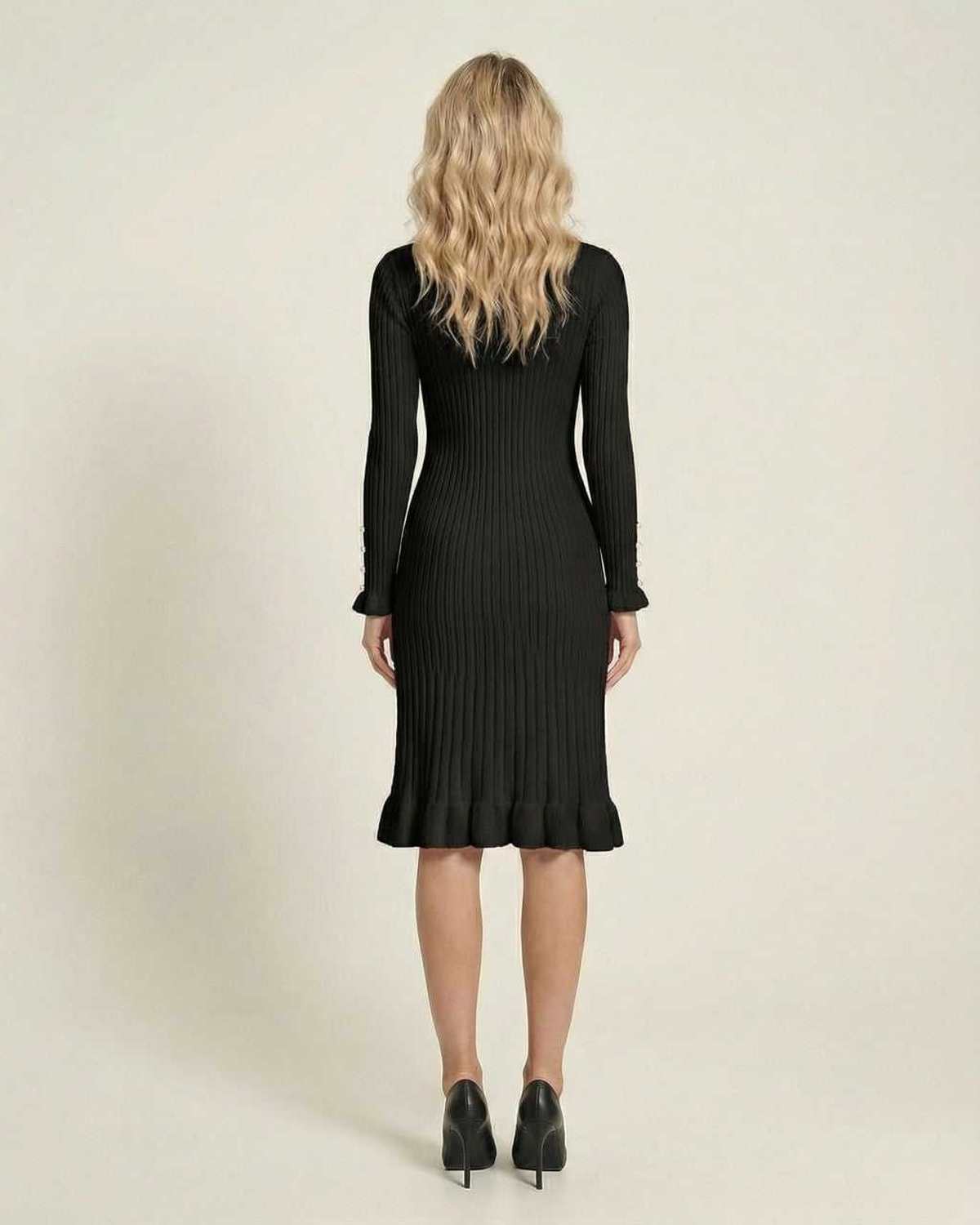 Back view of the Lauven Monaco Midi Dress, a black long sleeve bodycon midi dress with ruffle hem.