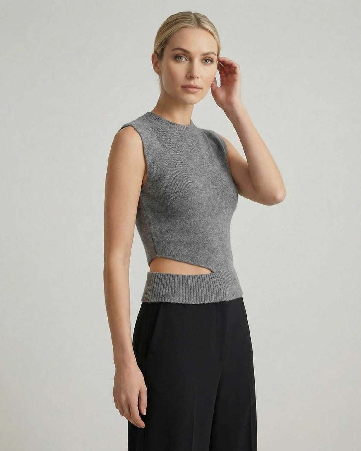 Monaco Top by Lauven - Women’s sleeveless knit top with cutout design for elegant casual wear.